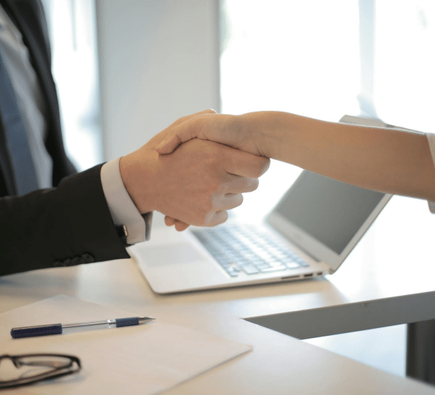 Handshaking over a Business Meeting